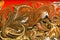 Gold marbling texture design. Red and golden marble pattern. Fluid art.