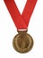 Gold medal on red ribbon