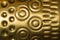 Gold metal texture with golden circles and dots pattern used as background