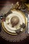 Gold metallic theme Christmas formal dinner table place setting - vertical.