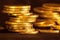 Gold money coin stacking on dark background