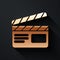 Gold Movie clapper icon isolated on black background. Film clapper board. Clapperboard sign. Cinema production or media