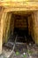 Gold - old roman tunnel in gold mine Rosia Montana, Transylvania