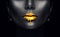 Gold paint drips from the lips, golden liquid drops on beautiful model girl`s mouth, creative abstract dark black skin makeup