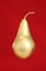 Gold pear on red background