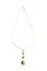 Gold pendant with emerald isolated on white