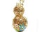 Gold pendant jewelery with diamond crystals