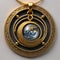 Gold pendant with moon planet