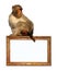 Gold picture frame with sitting macaque