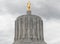 Gold pioneer statue atop the Oregon State Capitol Building