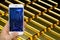 Gold Price Trading Concept Using Smartphone or Smart Device to M