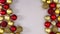 Gold and red Christmas ornaments appear and Happy New Year text write. Stop motion