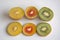 Gold, red and yellow kiwi fruit sliced