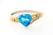 Gold ring with blue sapphire heart shaped