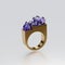 Gold ring decorated with blue crystal stones, designed with 3d.