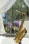 Gold saxophone in festive wedding ceremony decor