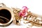 Gold Saxophone And Pink Rose on White Bk