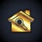 Gold Search house icon isolated on black background. Real estate symbol of a house under magnifying glass. Vector