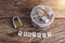 Gold security lock with pass-code and full coins with jar, Words