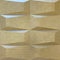 Gold shimmering 3D wall panel texture with wavy shape