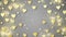 Gold shining hearts sparkle on the gray background with text. Valentines Day holiday abstract loop animation.