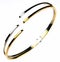 Gold and silver bangle