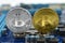 Gold and Silver bitcoin and motherboard