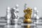 Gold and silver Chess Knight horse figure on Chessboard against opponent or enemy. Strategy, Conflict, management, business