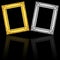 gold and silver frames isolated on black with reflection