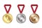 Gold, silver and gold medals on red ribbons. Prize awards for first, second and third place. Stock image