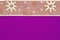 Gold snowflake ribbon on bright purple textured felt material background