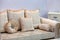 Gold sofa with pillows