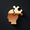 Gold Solution to the problem in psychology icon isolated on black background. Puzzle. Therapy for mental health. Long