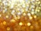 Gold sparkling glitter lights graduated background
