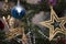 Gold star with blue ball in xmass tree