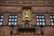 Gold statue of archbishop and statesman Absalon on facade of City Hall building in Copenhagen, Denmark. February 2020