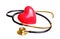 Gold stethoscope check red heart isolated on white