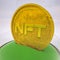 Gold stylized coin with the inscription nft in a case under a glass cover. crypto art concept. 3d render illustration