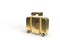 Gold suitcase with money and a euro sign on wheels in the form of a car on isolated background