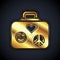 Gold Suitcase for travel icon isolated on black background. Traveling baggage sign. Retro hippie style. Travel luggage