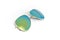 Gold sun glasses have a lens glass green yellow reflecting on an white background