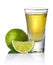 Gold tequila shot with lime on white