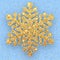 Gold textured six-pointed snowflake on a blue background with golden confetti. Snow flake Shining particles decor for greeting