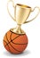 Gold trophy cup on top of the basketball ball