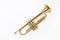 Gold trumpet on white background