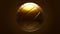 Gold volleyball ball isolated on brown background.