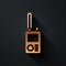 Gold Walkie talkie icon isolated on black background. Portable radio transmitter icon. Radio transceiver sign. Long