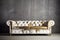 Gold weathered leather chesterfield sofa