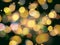 Gold yellow round blurred festive lights with sparkling effect o