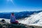 Goldeck - A girl admiring the snowy mountains